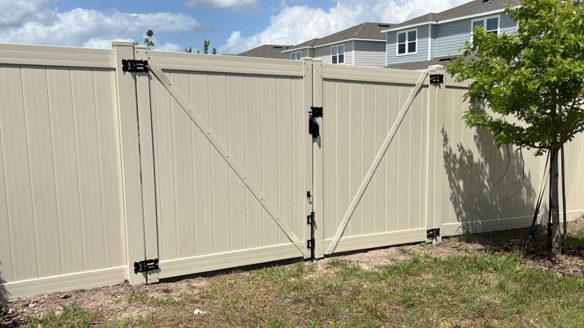 beige fence house