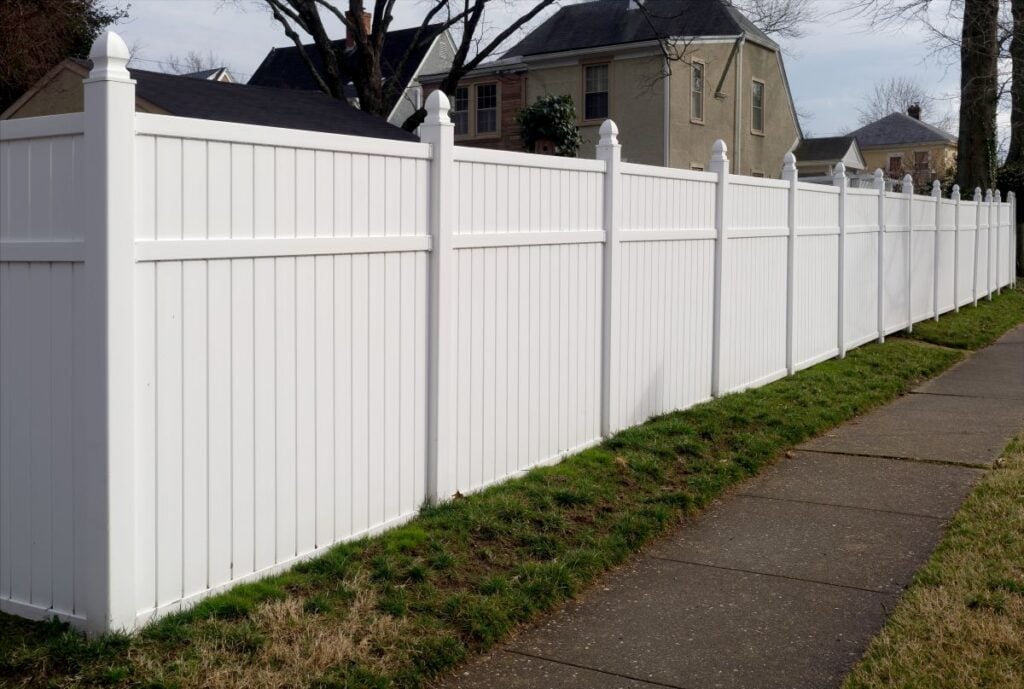 vinyl white fence huge house